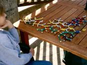 English: People with Asperger's Syndrome are often preoccupied with particular, specialized areas of knowledge, such as this boy's interest in molecular structure.