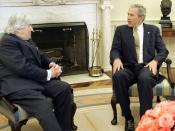 Wolfensohn (left) with U.S. President George W. Bush in the Oval Office, 2005.
