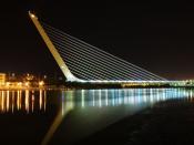 The Puente del Alamillo in Seville at night. The bridge was designed by Santiago Calatrava in 1992.