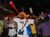English: Man blowing a vuvuzela, Cape Town, South Africa