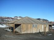 Hut remaining from the Discovery expedition with McMurdo Station in the background