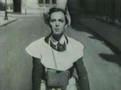 Pierre Batcheff bicycling in nun's clothing.