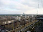 View of Chernobyl power plant taken from the roof of a building in Pripyat, Ukraine. Photo Taken by Jason Minshull.