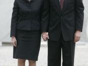 President George W. Bush and Laura Bush stand in silence after laying a wreath in the north reflecting pool at Ground Zero September 10, 2006, in commemoration of the fifth anniversary of the terrorist attacks of September 11, 2001, on the World Trade Cen