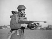 A British soldier equipped with a Thompson M1928 submachine gun (drum magazine), 25 November 1940
