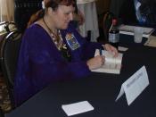 English: Author Mercedes Lackey giving autographs at CONvergence (convention).