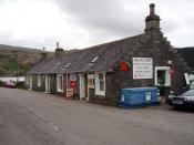 English: Strontian Post Office. Franchising and plastic signs have yet to get to the furthest reaches of Argyll. A sell everything traditional village shop, beside Loch Sunart.