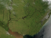 Español: Foto de Uruguay tomada desde satélite. Se aprecian claramente los límites con Brasil y Argentina, y el Río de la Plata al sur.