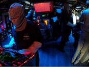 US Navy 070213-N-1328S-005 Sailor aboard the amphibious assault ship USS Boxer (LHD 4) monitors the surface search radar in the ship's combat Information Center during a general quarters drill