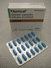 English: Orlistat (Xenical) capsules and packaging.