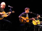 English: Robbie McIntosh, John Mayer and David Ryan Harris performing in 2009. Deutsch: Robbie McIntosh, John Mayer und David Ryan Harris bei einem Auftritt 2009.