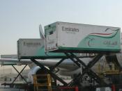 This is a photo showing the stocking of food onto an Emirates Airline plane by Emirates Flight Catering at Dubai International Airport in Dubai, United Arab Emirates on 23 September 2007.