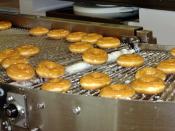 Krispy Kreme doughnuts being made at the Krispy Kreme restaurant at Kingsford Smith Airport, Sydney, Australia.