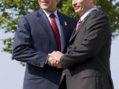 President George W. Bush of the United States and President Vladimir Putin of Russia, exchange handshakes Thursday, June 7, 2007, after their meeting at the G8 Summit in Heiligendamm, Germany.