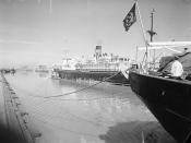 [Tugboat Escorting Passenger Ship, Nazi Cargo Ship Nearby, Houston Pipe Line Company]