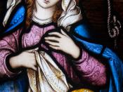 Detail of a stained glass window of the Holy Family, depicting Madonna and child (right part of the window).