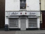 English: Outer Heaven - Out of business This tattoo and body piercing shop, on Old Street near the junction with Oldham Road, is now closed and is on the market for sale or to let. Perhaps people don't go much for body piercing during a recession. Bring b