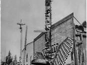 Totem poles in front of houses in Alert Bay, British Columbia in the 1900s.