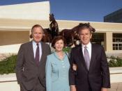 English: Former President Bush with son and daughter-in-law, Governor George W. and Laura Bush, at the George Bush Presidential Library Dedication in College Station, Texas