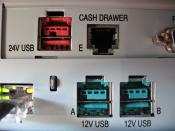 English: This is an image showing two types of powered USB ports (12v and 24v) as found on an NCR cash register.