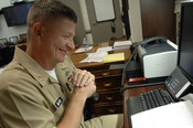 English: WASHINGTON (August 5, 2009) Master Chief Petty Officer of the Navy (MCPON) Rick West answers questions during a telephone interview with Navy wife and columnist Beth Wilson on Navy Homefront Talk! radio show. Navy Homefront Talk! is an internet t