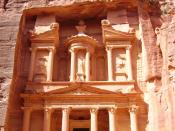 Petra is an extraordinary archaeological site in southwestern Jordan, lying on the slope of Mount Hor in a basin among the mountains which form the eastern flank of Arabah (Wadi Araba), the large valley running from the Dead Sea to the Gulf of Aqaba. The 
