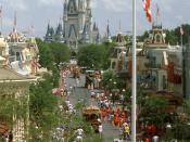 English: Main Street at the Magic Kingdom, Walt Disney World Resort, Lake Buena Vista, Florida, USA. The photo is taken presumably from the roof of the Walt Disney World Railroad, and the US Flag is in the foreground. In the background is the regal Cinder