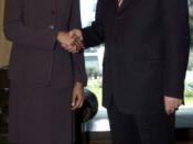 Former US Secretary of State Condoleezza Rice and Turkish President Abdullah Gül wearing Western-style business suits.