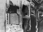 The aftermath of Kristallnacht, Jewish shops vandalized.