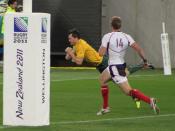 English: Australian rugby union player Adam Ashley-Cooper scores a try against USA during 2011 Rugby World Cup match.
