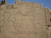 Thutmose III smiting enemies on the seventh pylon at Karnak.