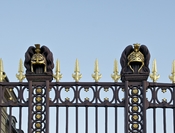 Two decorative ancient helmets on the gate of the Ecole Militaire in Paris.