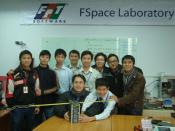 English: FSpace team members and F-1 nanosatellite