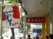 English: This is a photo of the American fast food chain Kentucky Fried Chicken and and the Chinese-based fast food Chain Yonghe Dawang. The similarieties between the Yonghe Dawang logo and the KFC logo depicting Colonel Harland Sanders are shown. In 2005