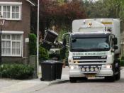 English: Garbage truck collecting garbage in Aardenburg.