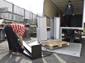 USACE donates office furniture to international nonprofit in Romania