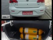 Picture taken at Sao Paulo, Brazil, of the new Fiat Siena Tetrafuel 1.4 model 2008 (two views edited with Photoshop, zoom in is the Tetrafuel logo -cut and paste from the same image-