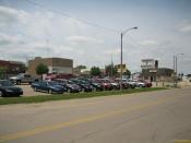 Downtown, car dealership and police station. Lena, Illinois, USA.