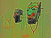 diorite mask in profile left beside to serpentin Malinaltepec mask (both were produced in Teotihuacán)