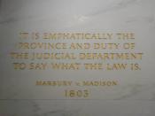 Inscription on the wall of the Supreme Court Building from Marbury v. Madison, in which Chief Justice John Marshall outlined the concept of judicial review.