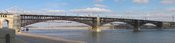 This is a panoramic image of the Eads Bridge and Martin Luther King Bridge which span the Mississippi River at St. Louis, Missouri. This is a composite of four images taken with a Kodak P850 digital camera that were stitched with the hugin panorama tool.