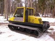 1990 Bombardier BR100+ trail groomer with aluminum track grousers.