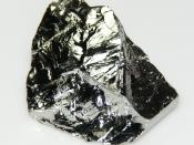 English: 12 grams polycrystalline germanium, 2*3 cm. Deutsch: 12 Gramm polykristallines Germanium, 2*3 cm.