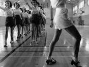 English: Tap dancing class in the gymnasium at Iowa State College. Ames, Iowa.