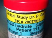 English: A bottle of LSD from a Swiss clinical trial for end-of-life anxiety in cancer patients, circa 2007, conducted by Dr. Peter Gasser, sponsored by the Multidisciplinary Association for Psychedelic Studies. The opaque bottle has a red cap and a yello