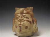 English: Moche ceramic vessel depicting a man with face painting