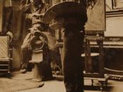 N.C. Wyeth in his studio with a cowboy model
