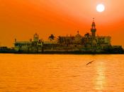 The Haji Ali Dargah, in the Mahim Bay can be reached from Mahalaxmi by a narrow causeway, and that only at high tide, when it is above the sea. A handsome example of Indian Islamic architecture, associated with legends about doomed lovers, the dargah cont