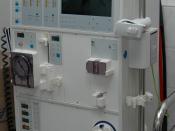 A hemodialysis machine, used to physiologically aid or replace the kidneys in renal failure
