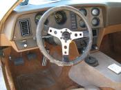 1974 Bricklin SV-1 sports car - interior view of dashboard. Standard American Motors (AMC) powertrain including the 360 CID (5.9 L) V8 engine and four-speed manual transmission.